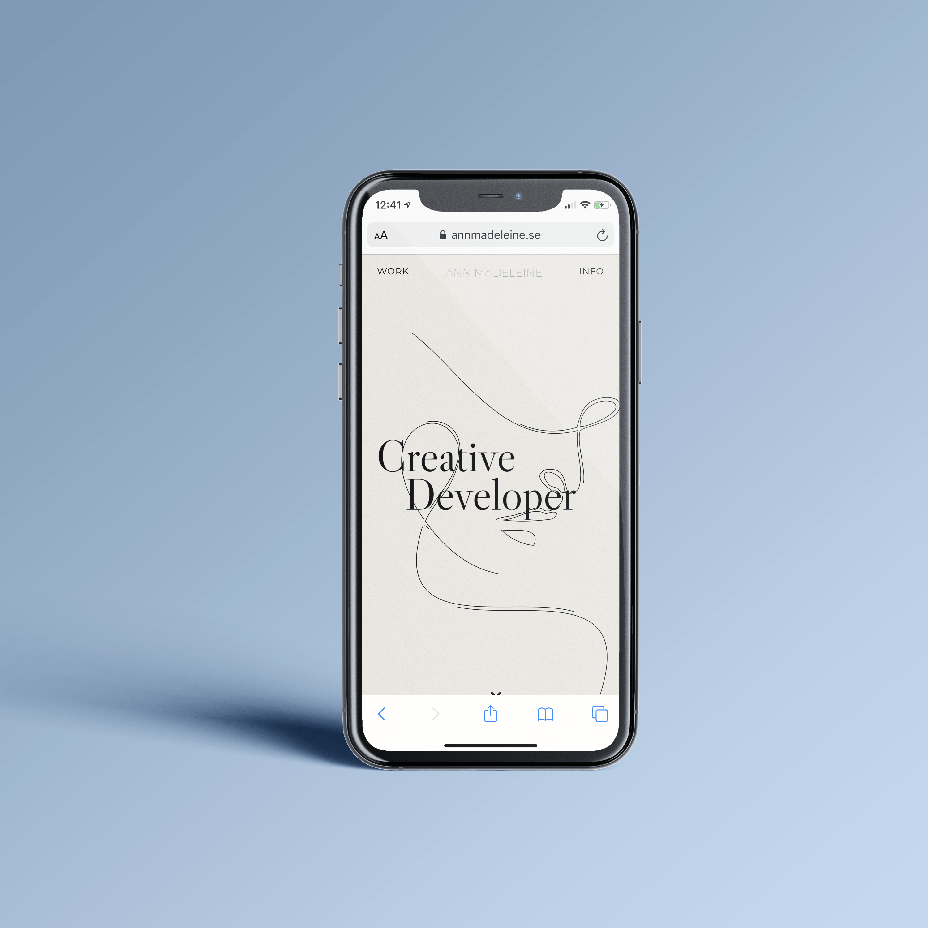 Iphone with Ann Madeleine's portfolio.